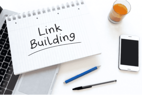 Link building written on a tablet